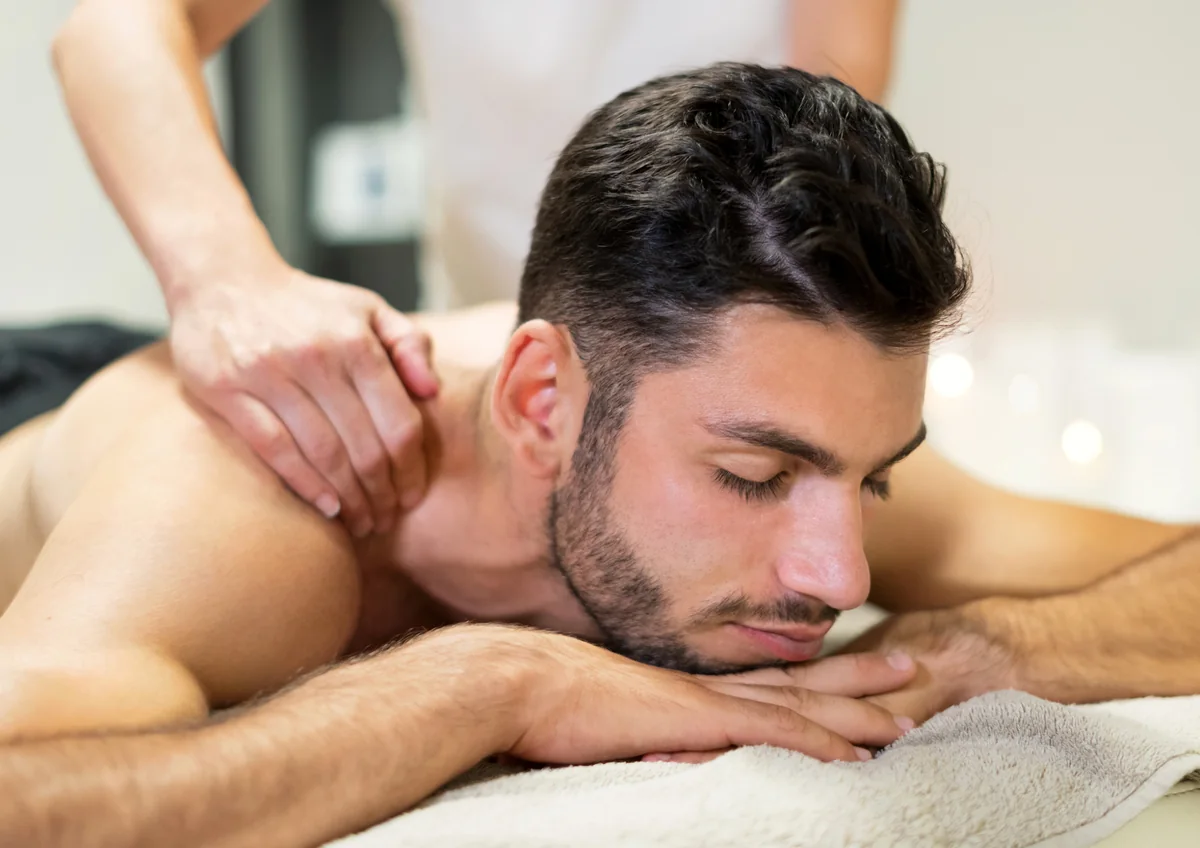 Man relaxing during a back massage